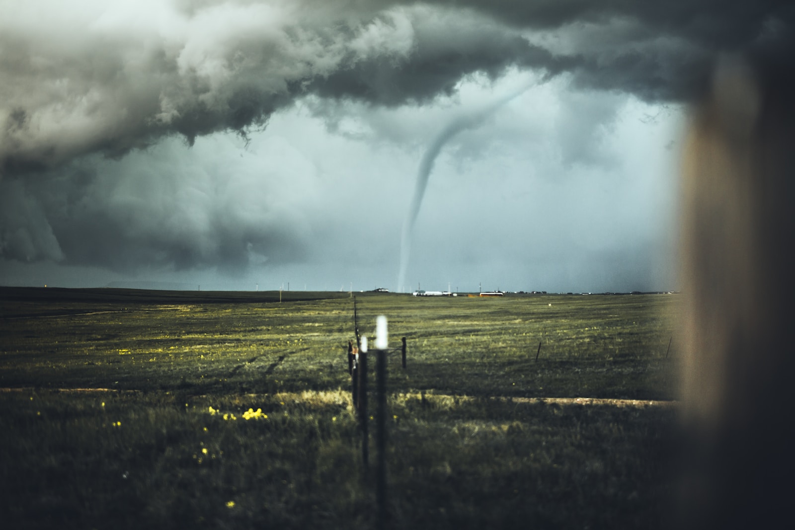 tornado on far side on plain