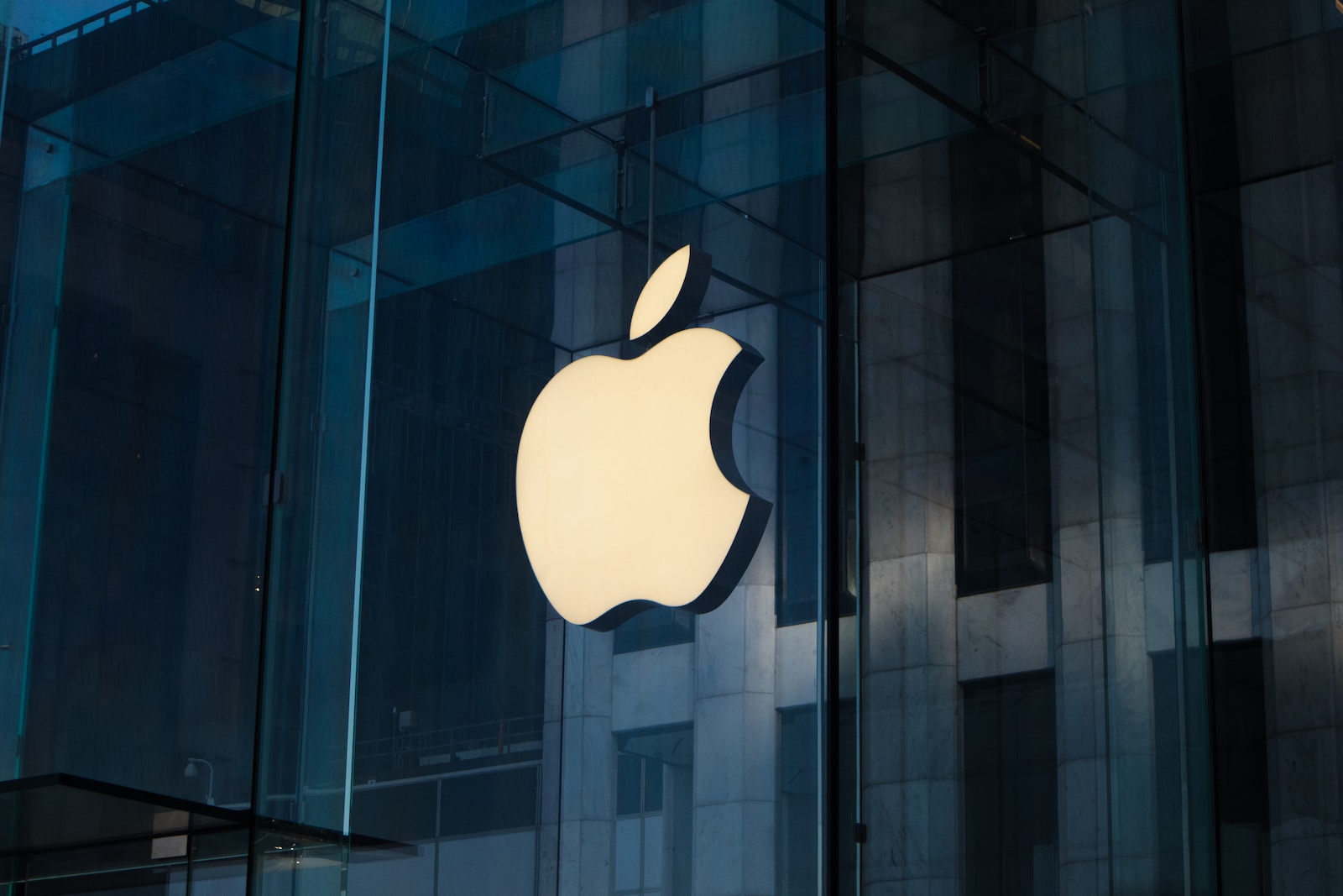 apple logo on glass window